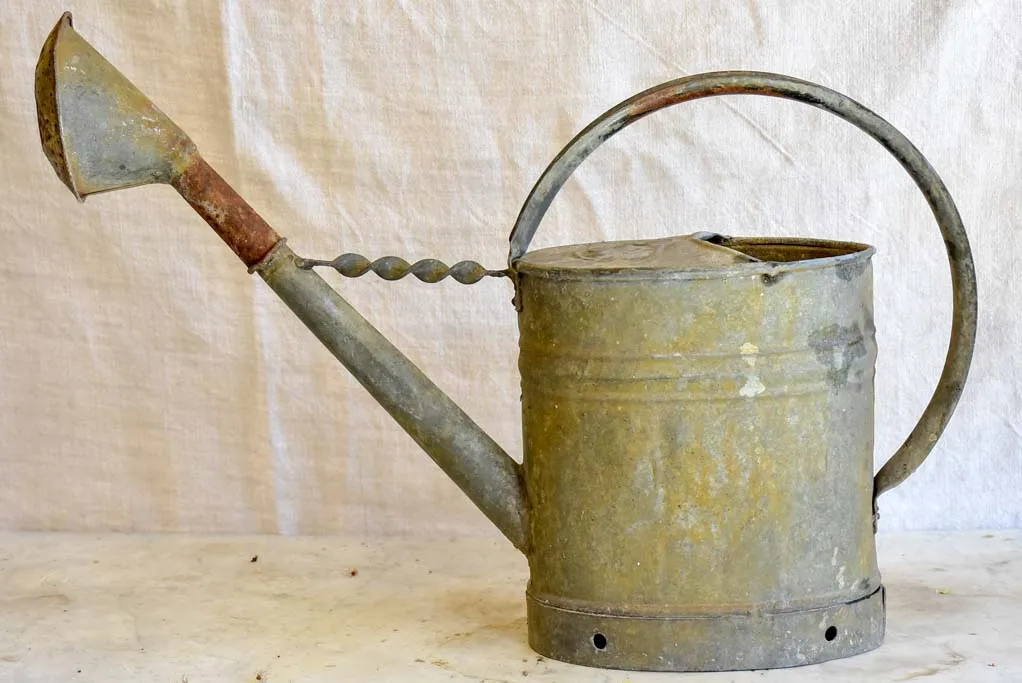 Vintage French zinc watering can with twisted brace