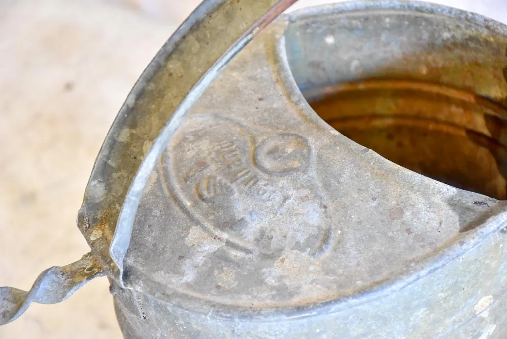 Vintage French zinc watering can with twisted brace