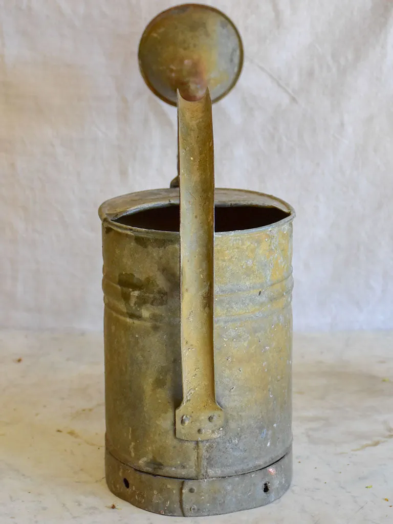 Vintage French zinc watering can with twisted brace